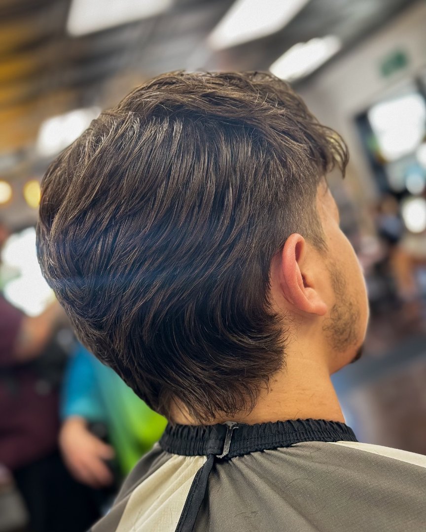 Textured flow with a tapered neckline